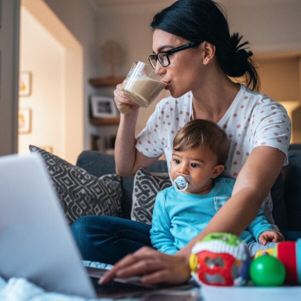 mom at laptop with baby